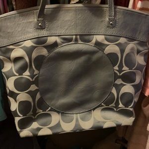 Silver/ grey coach large purse. Some signs of use.